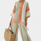Elisabetta – haut asymétrique élégant et pantalon à jambes larges